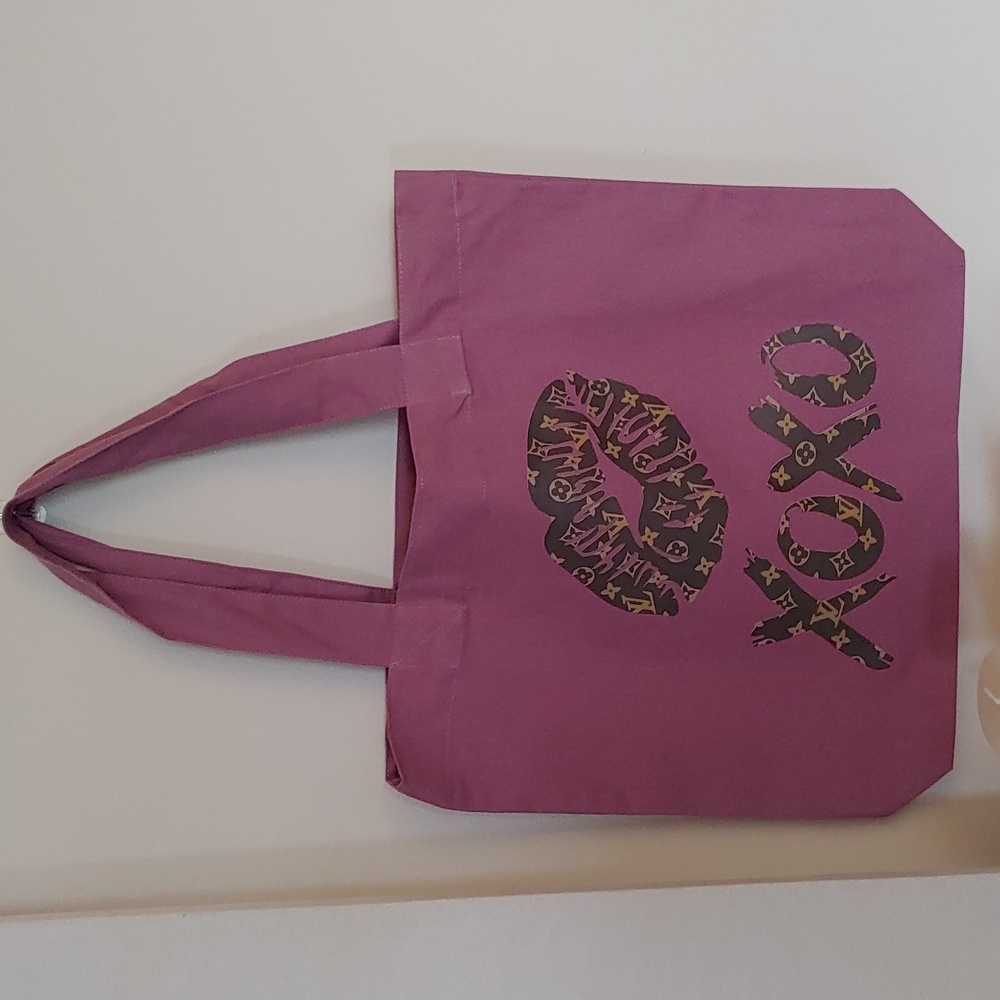 NWOT CANVAS TOTE--will put your name on it ...if u would like. :)